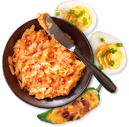 a bowl with prices cheese and two eggs with prices cheese.